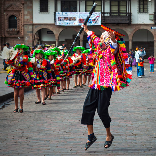 Inti Raymi Indigenous performer in Cusco An indigenous Quechua performer jumping on the Plaza de Armas (main square) of Cusco during the Inti Raymi Sun Festival celebration, Peru, South America. inti raymi stock pictures, royalty-free photos & images