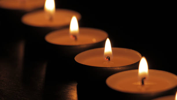istock Candles in the Dark 980996754
