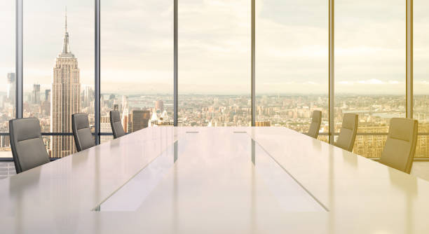 istock Large modern office desk with view at the skyscrapers 981003110