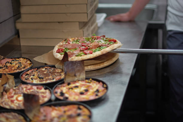 istock Hot Italian pizza is only from the oven in the oven. selective focus, copy space. 981003234
