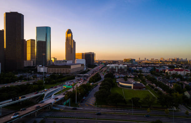 istock Traffic at rush hour Morning Traffic and Downtown Distant view Houston Texas Skyline Cityscape 981003872
