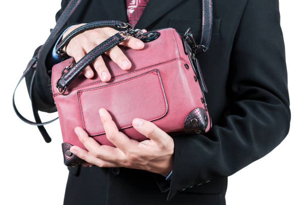 istock Businessman with briefcase in hands 981010044