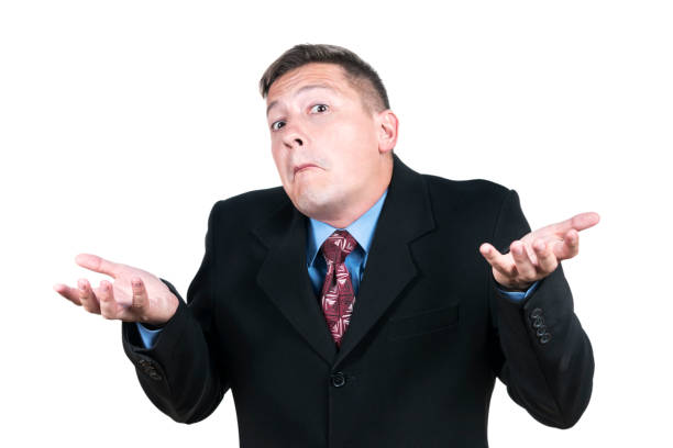 istock Businessman shrugs his shoulders 981010072
