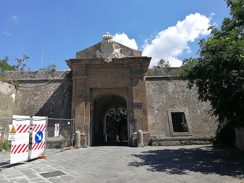 Bacoli, Naples, Campania, Italy - June 16th 2018: Access to the Aragonese Castle of Baia, site of the Archaeological Museum of the Phlegraean Fields