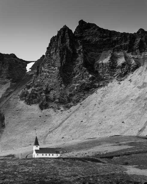 istock Chapel of Vik y Myrdal with massive mountains in the background 981032012
