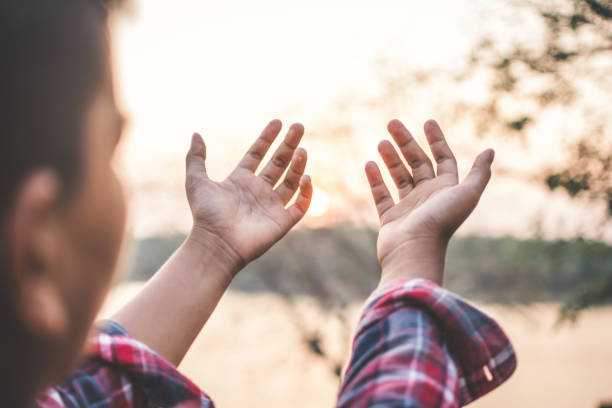 istock Close-Up Of Boy Gesturing By Lake 981044194