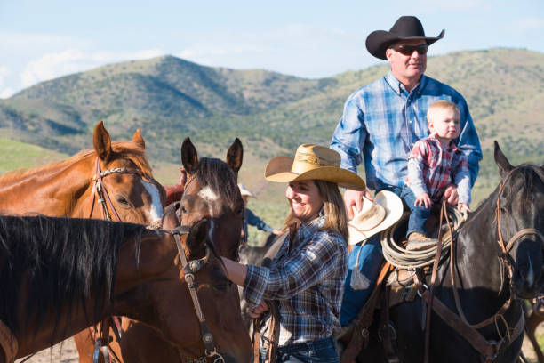 istock Western Family Saddle Up Their Horses 981053476