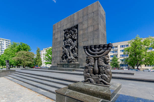 The Monument to the Ghetto Heroes The Monument to the Ghetto Heroes, designed by Natan Rapaport. Warsaw, masovian province, Poland. guerrilla warfare photos stock pictures, royalty-free photos & images