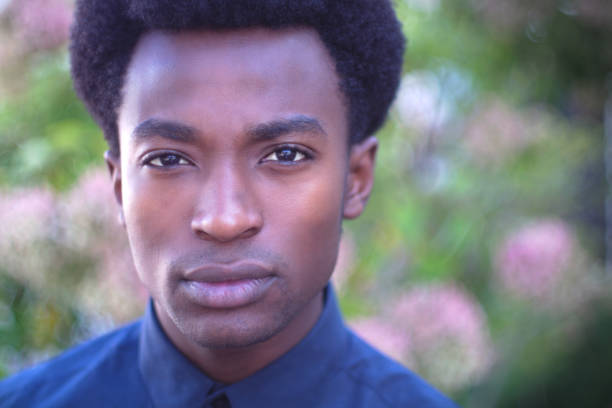 istock young man looking angry cynical expression suspicious wondering face 981061006