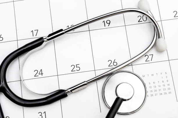 istock Stethoscope on calendar. Medical appointment concept. 981065034