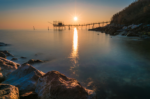Wooden architecture on the Adriatic sea at sunrise