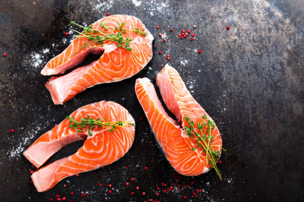 istock Salmon. Fresh salmon fish. Raw salmon fish steaks 981088274