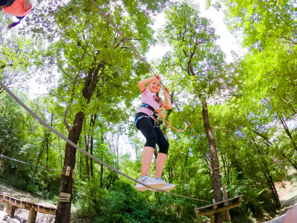 istock Young Girl Enjoying in Fun Park in Forest 981108602