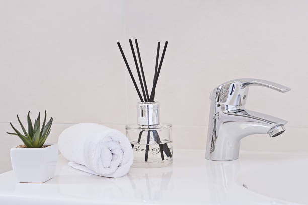 istock Chrome water tap and sink. Bathroom interior and accessories concept 981125980