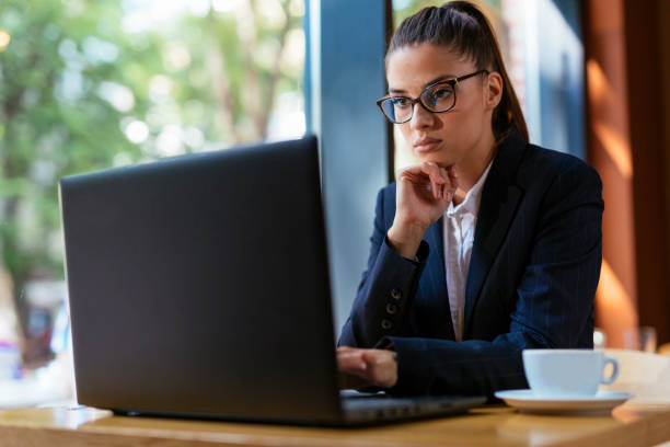 istock Young businesswoman thinking about job 981130276