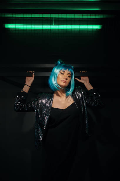 istock Pop girl portrait wearing blue wig 981137196