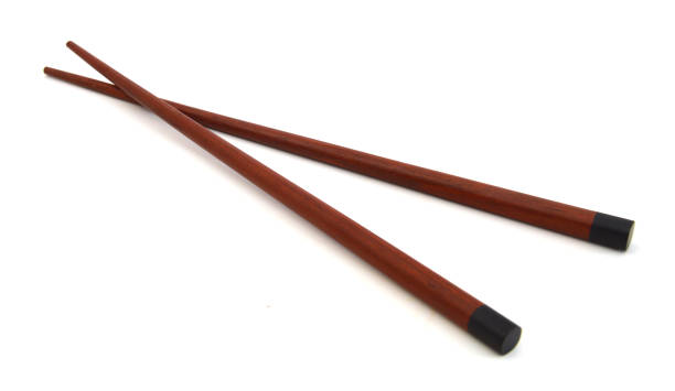 istock Wooden chopsticks, isolated on white background. 981139362