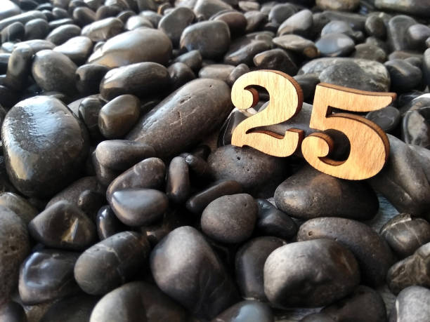 istock twenty-five number of wood on stones 981147898