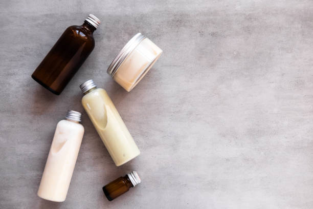 Bottles with spa cosmetic products flatlay stock photo