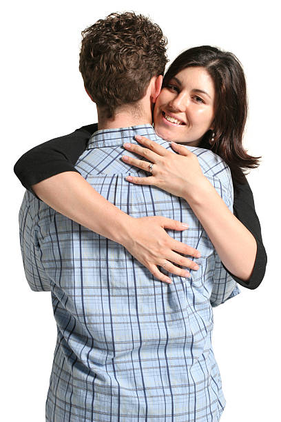 istock Wife hugs husband 98116960