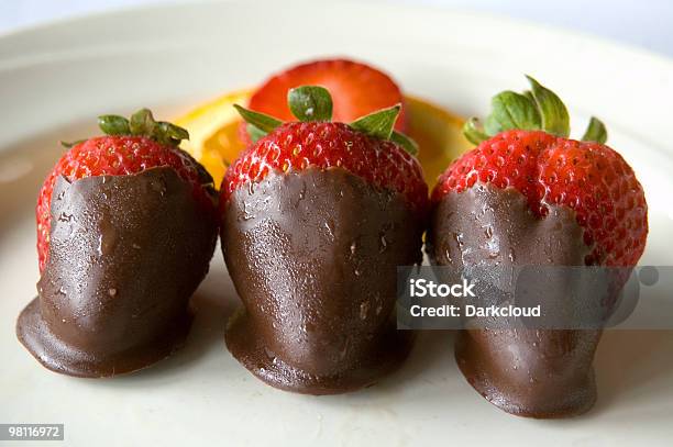 Glistening Strawberries Dipped In Chocolate Stock Photo - Download Image Now - Antioxidant, Berry Fruit, Chocolate