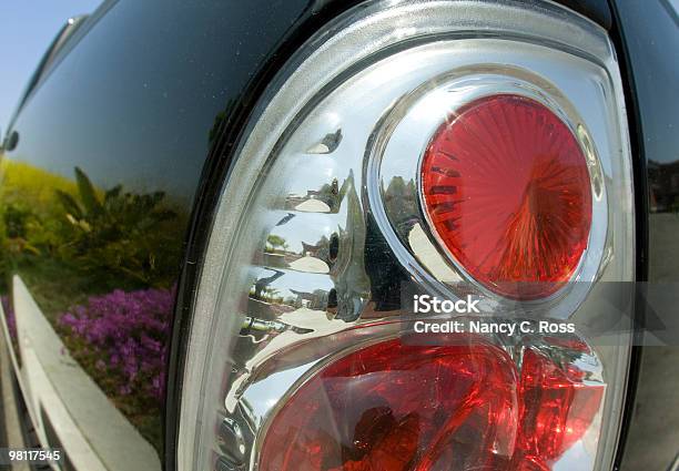 Reflection In Dirty Truck Automobile Taillight Closeup Stock Photo - Download Image Now