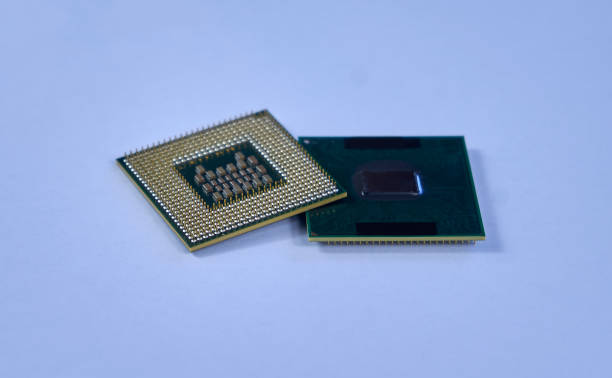 istock Two different CPUs showing different types of connections on blue background 981176498