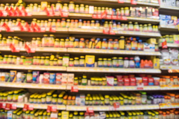 istock Abstract blurred vitamin store shelves variation of supplements 981186154