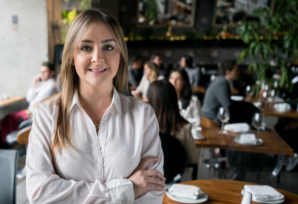istock Successful business owner at a restaurant 981193858