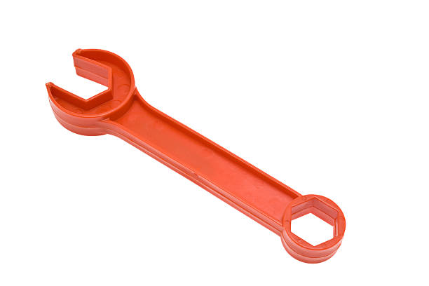 Red plastic spanner stock photo