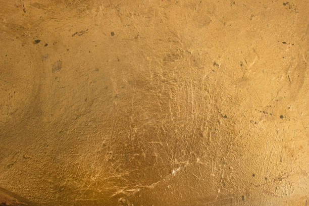 istock Gold background. Gold surface of the table. 981211608