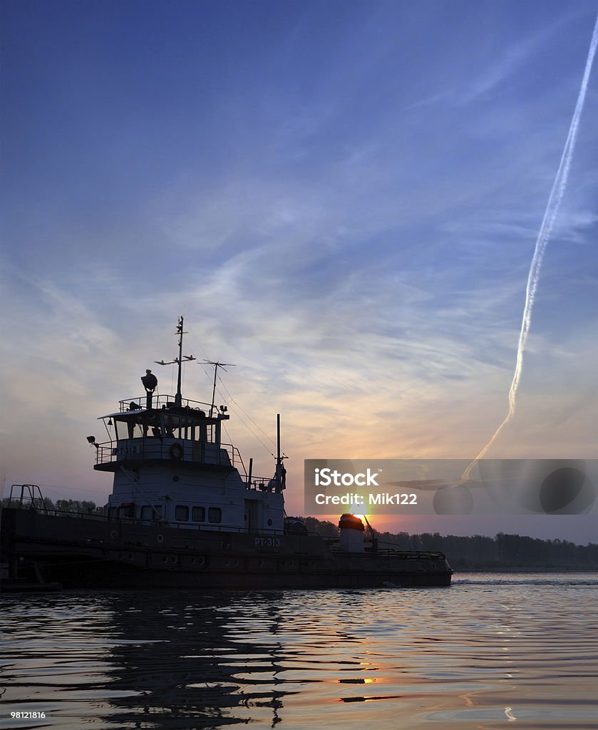 sunset on river and ship  Beauty In Nature Stock Photo