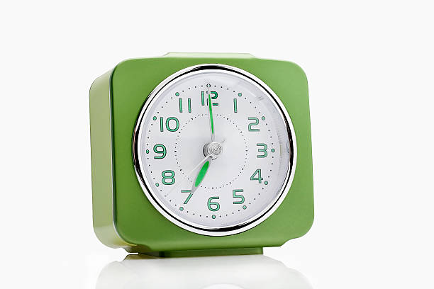 Green alarm clock stock photo