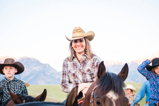 istock Western Family On Horseback. 981249010