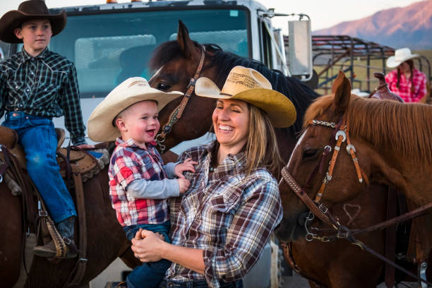 istock Western Family On Horseback. 981249020