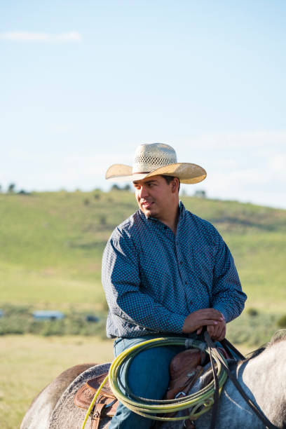 istock Cowboy Riding Horseback 981249096