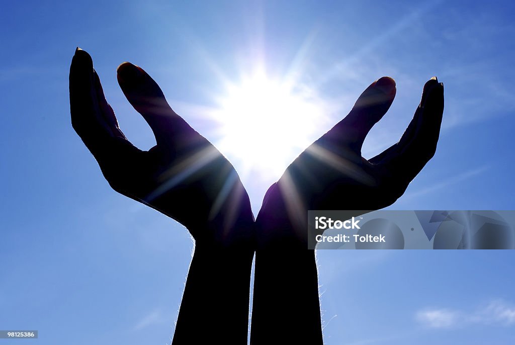 Słońce w ręce - Zbiór zdjęć royalty-free (Niebo - Życie pozagrobowe)