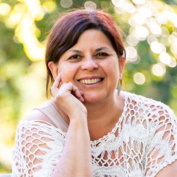 istock Smiling mature woman looking at the camera 981269490