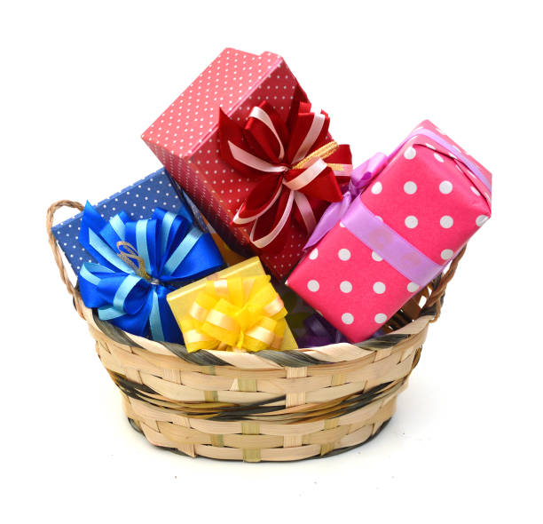 istock Holiday gift boxes collection in basket on white background 981287338