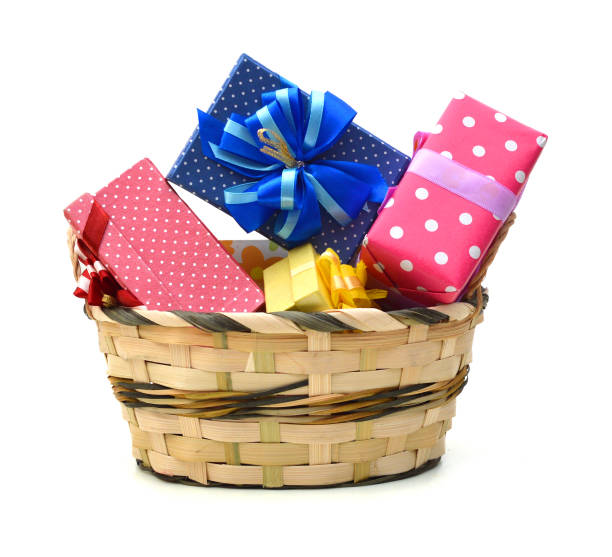 istock Holiday gift boxes collection in basket on white background 981287772