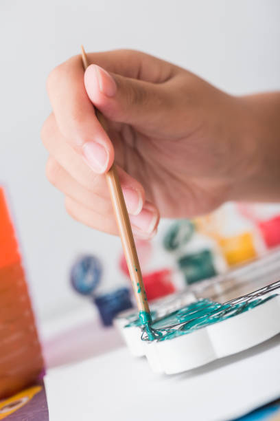 istock Children learn coloring and painting in classroom. 981290764