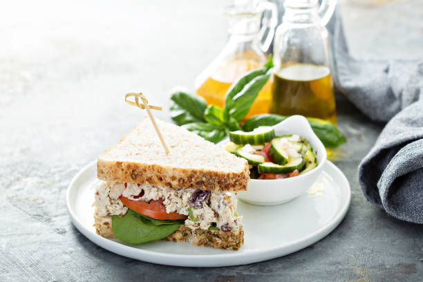 istock Chicken salad sandwich with spinach and tomato 981303450