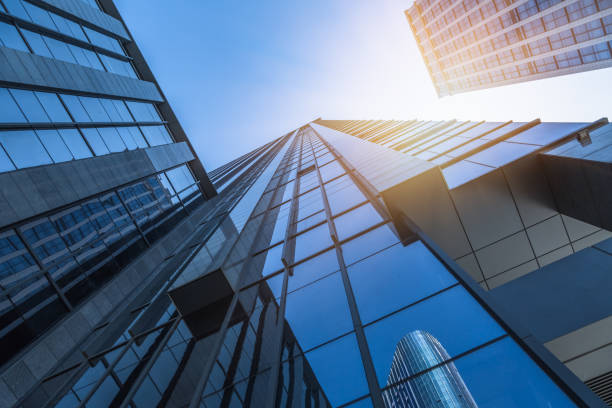 istock Low angle view of modern metallic skyscrapers 981303870