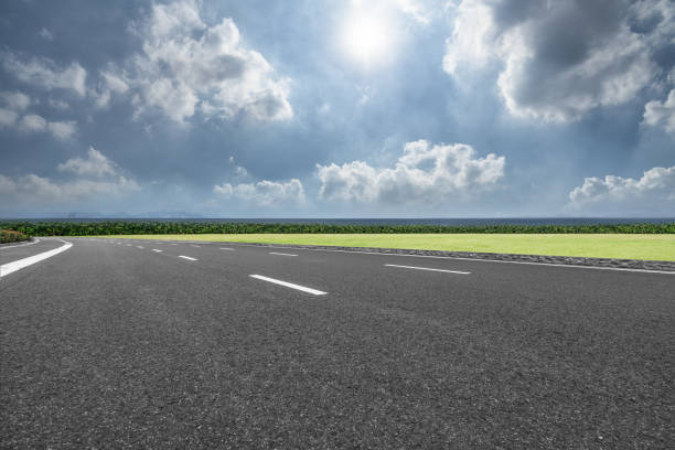 istock Asphalt road and sea coast line 981310764