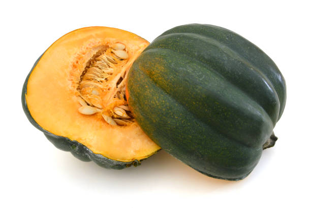 istock Two halves of an acorn squash on white 981314468