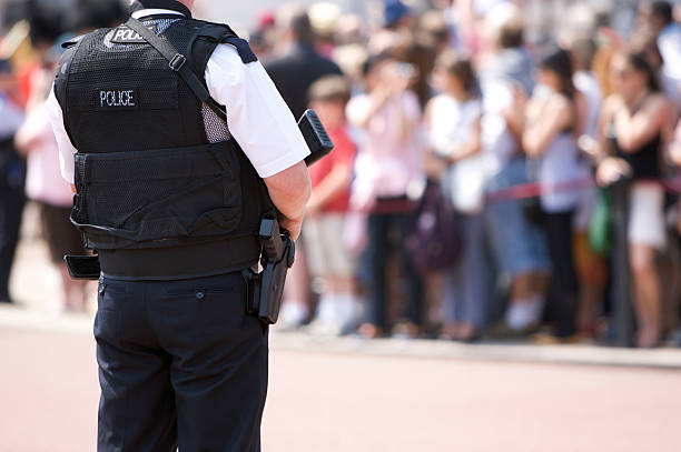 istock Armed Police Officer outside Buckingham Palace 98131626
