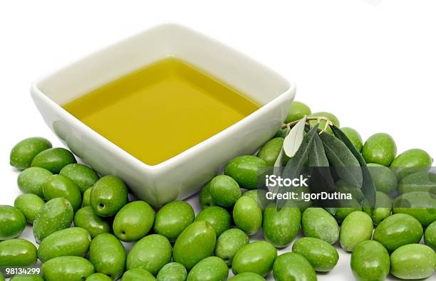 Green Olives And Olive Oil Stock Photo - Download Image Now - Bowl, Color Image, Cooking Oil