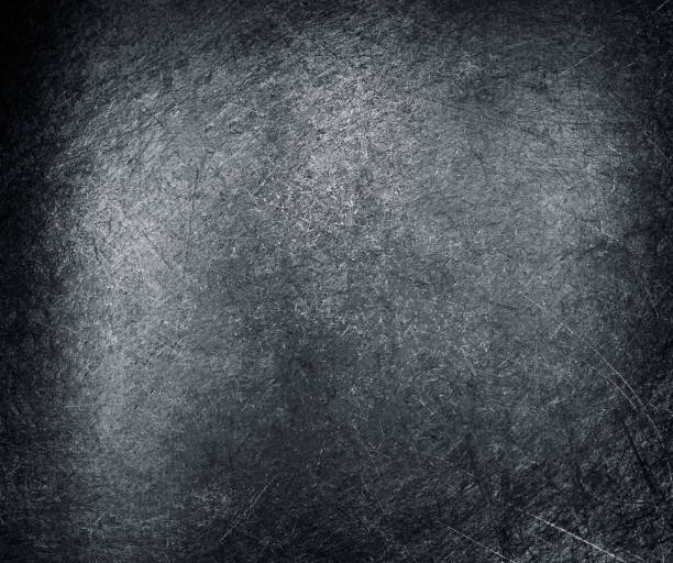 istock Dark grunge metal textured wall background 981354130