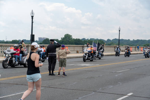 Washington DC May 27, 2018: Rolling Thunder Motorcycle rally crosses Memorial Bridge entering Washington DC from Arlington Virginia. The rally is to bring attention to POWs and MIAs of US-involved wars.