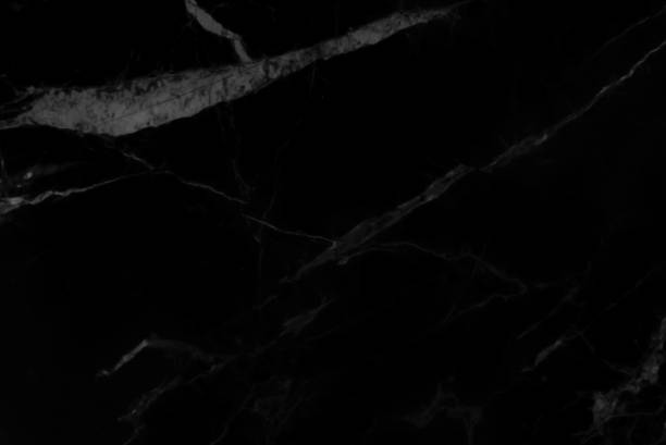 istock Abstract black marble background with natural motifs. 981371198